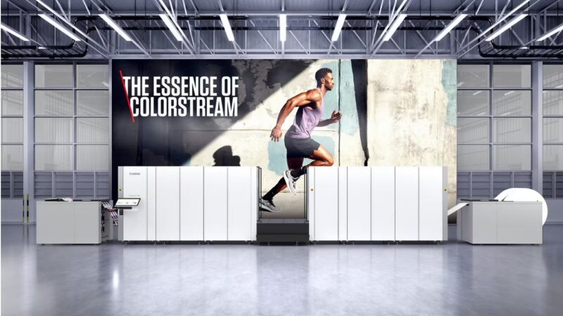 Canon ColorStream 7000. Taustalla juliste juoksevasta miehestä.